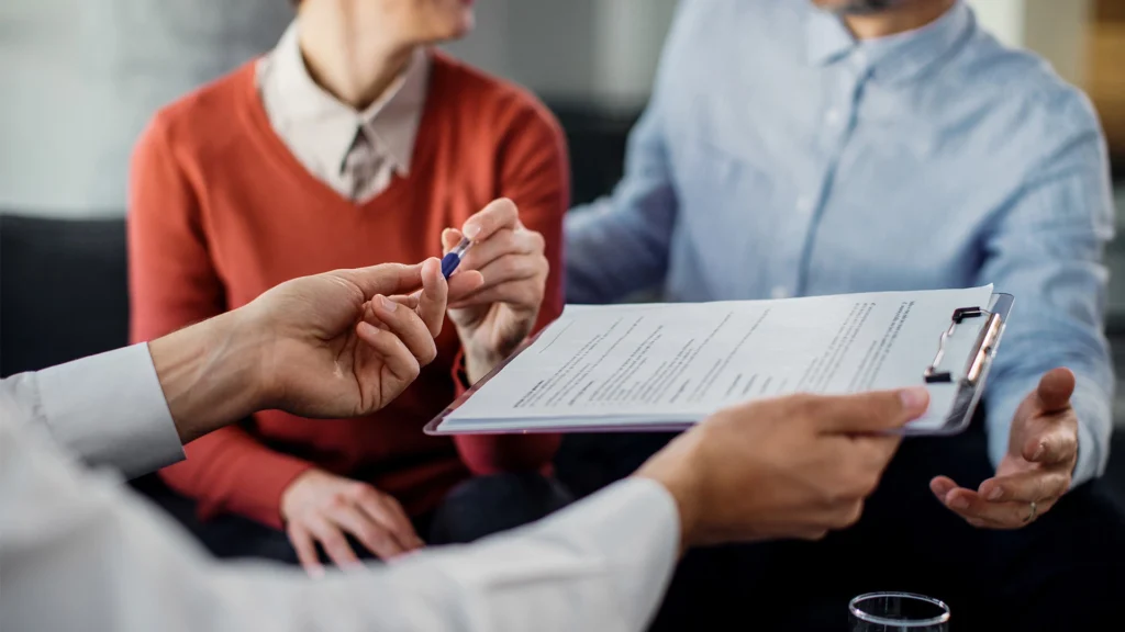 A newly licensed agent who used our insurance prelicense course is writing their first policy.